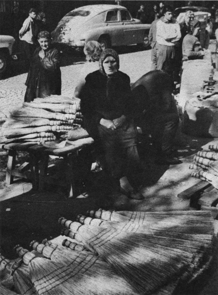 The broom lady in the market.