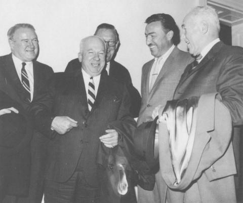 Powell at the Capitol in 1965 discussing the problem of jobs for black baseball players after their sports careers end. From left: Joe Cronin, American League President, Warren Giles, National League President; Paul Porter, counsel to the baseball commissioner, Powell and Ford Frick, Commissioner of baseball. Wide/World Photos Inc.