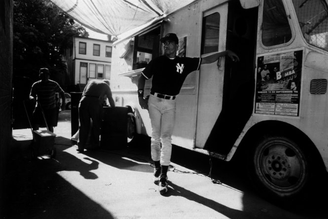 José Santana, 24, waits for a snack at a fast food truck during the intermission of a double-header in South Brooklyn. Santana, like many of the players, briefly was a minor leaguer before being released due to a knee injury.