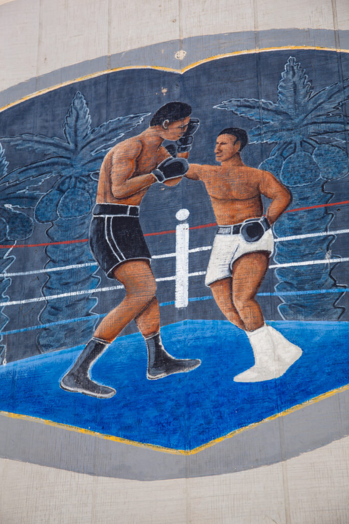 Painting on the front of the now-closed Thermal Boxing Club in Thermal, California.