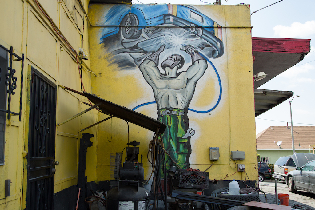 This illustration of a muffler installation was created a dozen years ago by an itinerant painter named Alex at Cesar Chavez Body Shop, 1400 Cesar E. Chavez Avenue in East Los Angeles.
