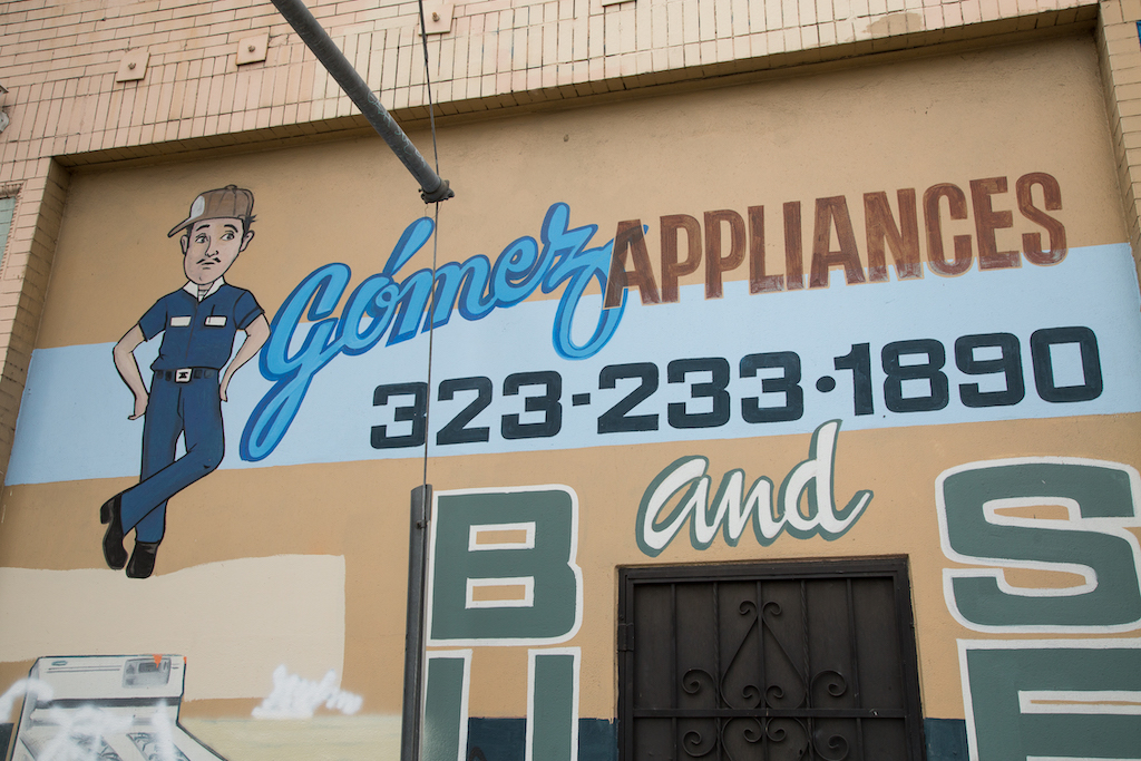 At 5401 S. Central Avenue, Gómez Appliances has a profusion of fonts, a dapper-looking repairman and illustrations of ranges and refrigerators.