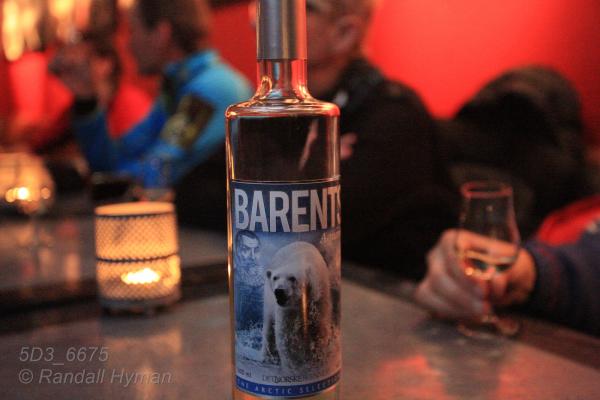 Bottle of locally-made Barents aquavit in Karlsberger Pub in Longyearbyen, Svalbard, Norway.