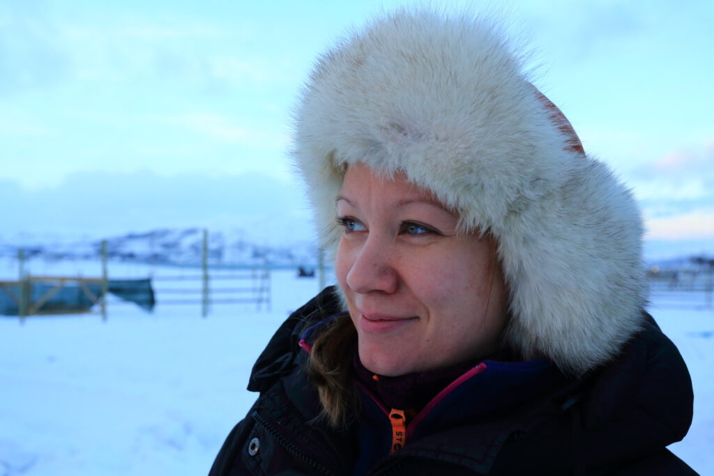 Portrait of Berit Oskal-Somby, quoted in story, in icy pasture near Tromsø, Norway.