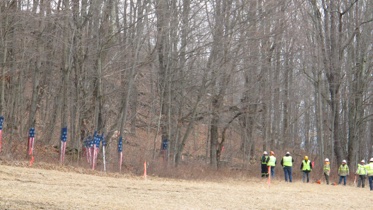 Contractors for the now abandoned Constitution Pipeline prepare to fell trees (some painted with the Stars and Stripes) in the right-of-way on the land of the Holleran family in March 2016.