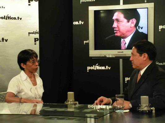 Journalist Regina Martinez interviews local legislator Alejandro Montano, for Politica TV in Xalapa, Veracruz, in 2006. Photo: Proceso