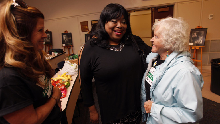 Marietta Jaeger greets Marilyn Shankle-Grant, mother of a death row prisoner in Texas, and Terri Steinberg (at left), whose son was on Virginia’s death row for more than a decade.