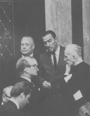Adam Clayton Powell, Jr., inside the House chamber in 1969 after being re-elected following his ouster. House speaker John McCormack of Massachusetts is in foreground. Wide World Photos, Inc.