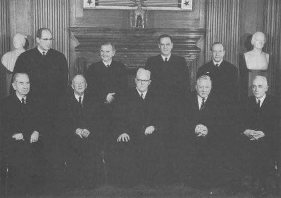 The U.S. Supreme Court during Powell’s case. Seated from left: Justice Tom C. Clark, Justice Hugo L. Black, Chief Justice Earl Warren, Justice William 0. Douglas, and Justice John M. Harlan. Standing are Justices Byron R. White, William J. Brennan, Jr., Potter Stewart, and Abe Fortas. Wide World Photos, Inc.