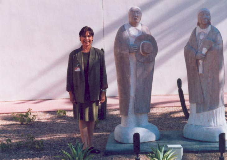 Gloria Lamahaftewa, a Hopi, is assistant to the director for Native American relations at the Heard Museum in Phoenix. She stands in the museum’s sculpture garden. Photo by Julia Klein.