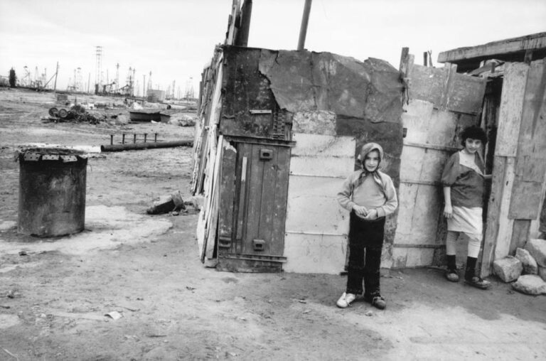 Baku onshore oil fields. Azeri refugees live on abandoned sections of the oil field.