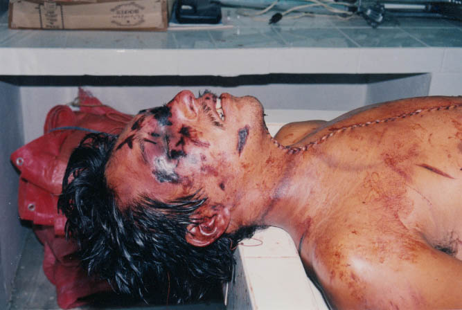 Salvador Valdez’ battered body. False rumors were spread that the men were child kidnappers who trafficked in children’s organs. Photo by Jorge Muedano