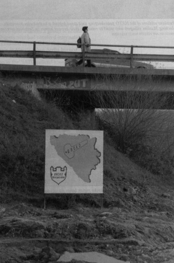 A billboard shows the out line of a key with Brcko written on it, imposed on a map of Bosnia. This illustrates the common view that the northeastern city holds the key to the future of Bosnia and whether there will be more fighting in the Balkans.