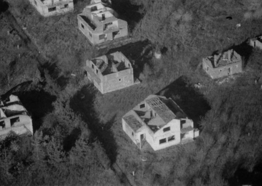 An aerial new shows destroyed houses in northeastern Bosnia.