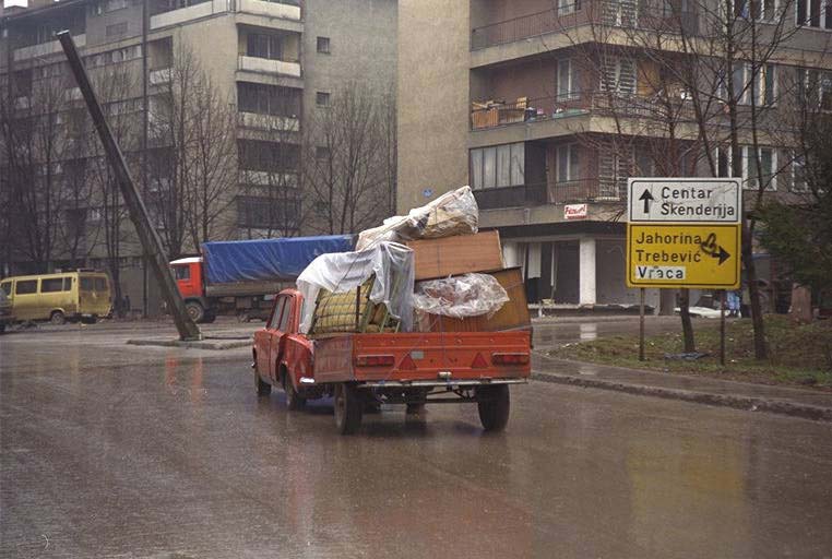 A family drives out of Grbavica on March 17. This was the last Serb area in Sarajevo handed over to the Muslim-Croat federation two days later.