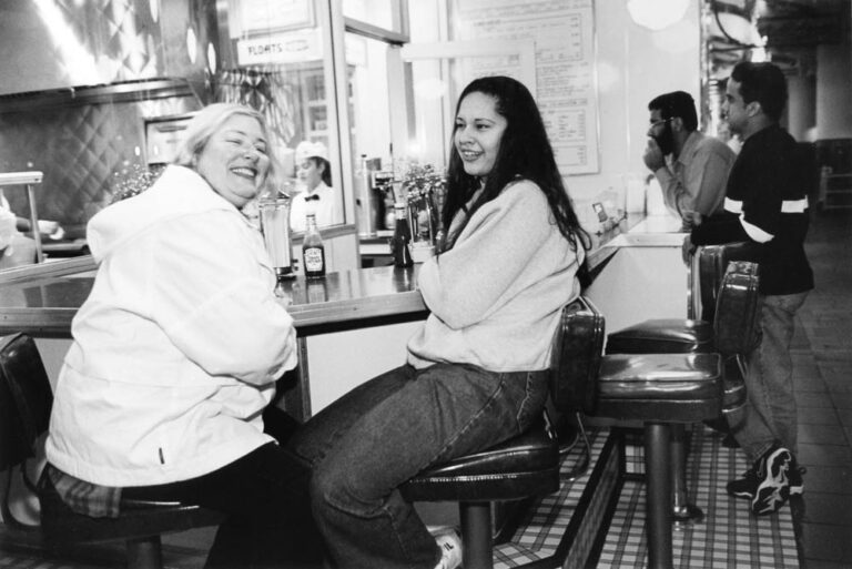 After school, Herika meets her mentor, Barbara Joy Lafy, at a soda fountain counter in the Culver City Mall. “Herika makes me laugh and she amazes me. She has so much self-confidence and poise for someone her age,” says Barbara Joy. Photo by APF Fellow Donna Decesare