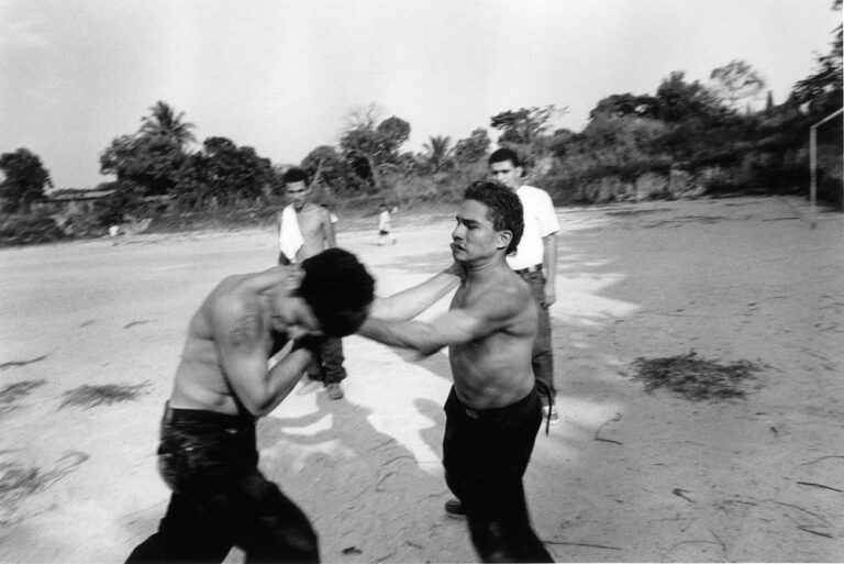 A homeboy being “disciplined” in a one-on-one fight during a gang meeting. Shy Boy explains that the meetings, known both in the U.S. and in El Salvador as “giving court,” are how the Mara Salvatrucha gang stays united.