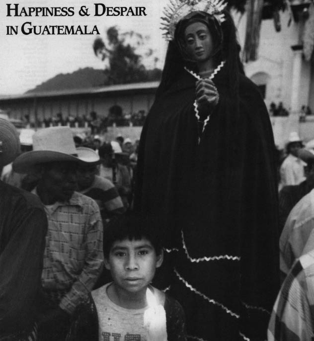 A young boy participates in the holy week procession in Santiago, Atitlan.
