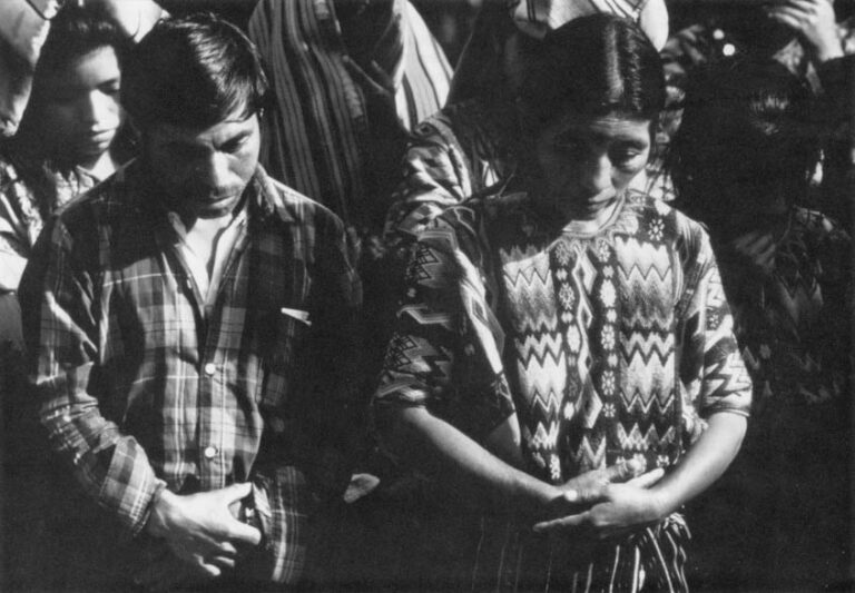 Two residents of Chontala, in the western highlands of Guatemala, pray over eight bodies of members of their community. They were killed during the army’s counter-insurgency campaign in the early 1980’s.