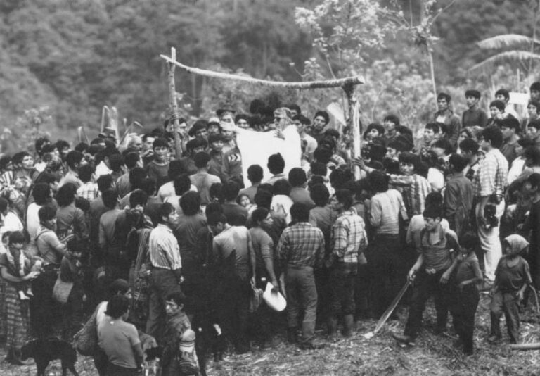 Father Geronimo, an Italian Catholic priest, offers mass to members of the Communities in Resistence (CPR) in the remote mountains of the Quiche region. These communities are considered “collaborators” with the rebel insurgency by the Guatemalan Army.