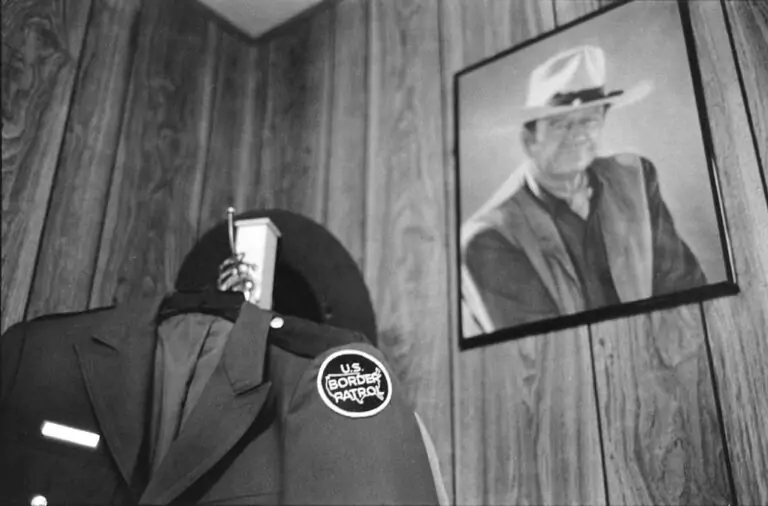 The U.S. Border Patrol office in Tucson, Arizona, features John Wayne on the wall.