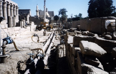 The Egyptians are trying to deal with water problems by pumping water near the temple.