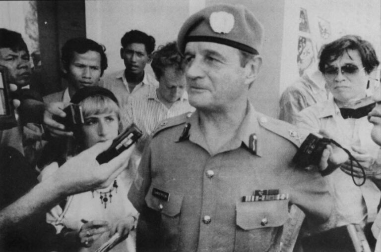 The Australian Commander of the United Nations Froces in Cambodia, John Sanderson, is shown arriving at Pochentung airport in Cambodia. Cambodian unity leader Prince Norodom Sihanouk welcomed the U.N.'s largest peacekeeping operation and declared his people can now "begin their convalescence" from two decades of strife. AP/Wide World Photos.