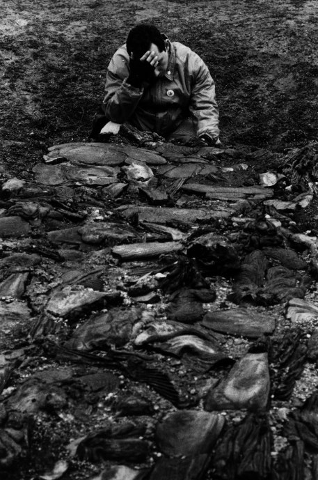 A visitor to Treblinka mourns at one of the long pits where Germans threw the bodies of camp prisoners. Yankel Wiernik was a prisoner who had to dig up and burn some of the hundreds of thousands of corpses that had been dumped in vast pits behind the gas chambers. "The sight was terrifying, the worst that human eyes have ever beheld," he said in "A Year in Treblinka."
