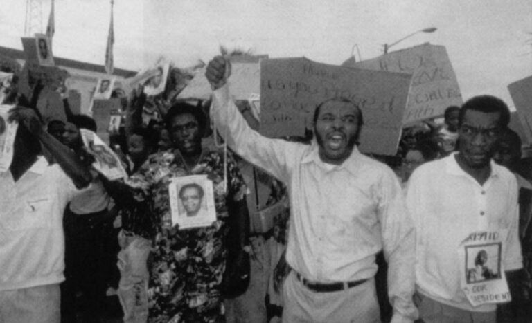 Haitians are docile on domestic issues, but vociferous on international ones. They took to the streets of Delray Beach to protest the September, 1991 coup against President Jean Bertrand Aristide. Photo by Caroline E. Couig, The Palm Beach Post