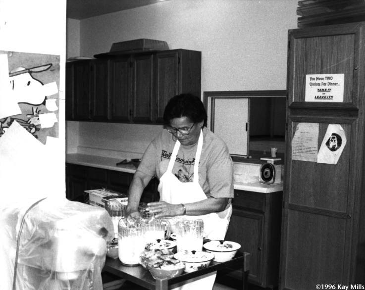 Panna Garrison, one of Fort Belknap's Head Start cooks, prepares lunch. She's had children and grandchildren in the Head Start program.