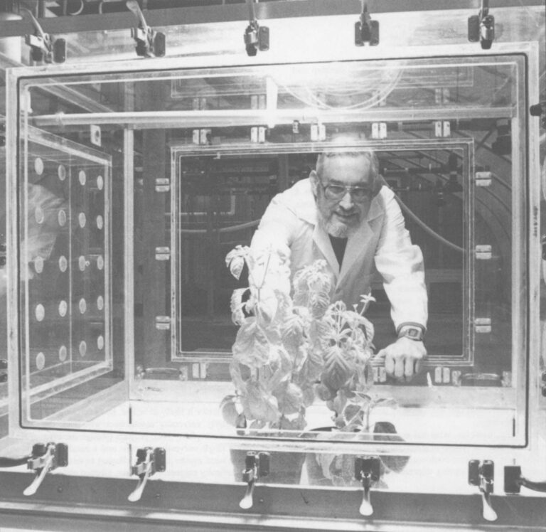 Cornell University professor James Gillett uses a terrestrial microcosm chamber for experiments involving genetic engineering. Photo courtesy of Cornell University News.