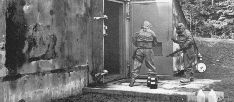 Soldiers from the Anniston Army Depot inspect a chemical weapons bunker for leaks. Department of Army Photo.
