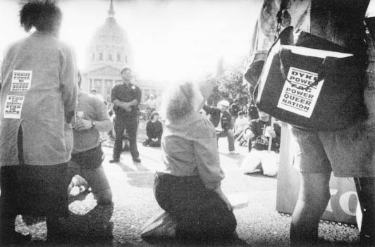 Many members of the lesbian community, shown here protesting a Christian prayer meeting in San Francisco, have joined in the AIDS home care networks in cities across America.