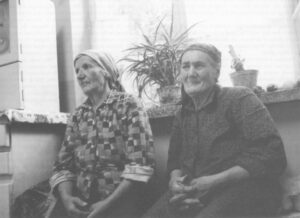 Impoverished farmer Marianna Kowalewicz (right) and her neighbor.