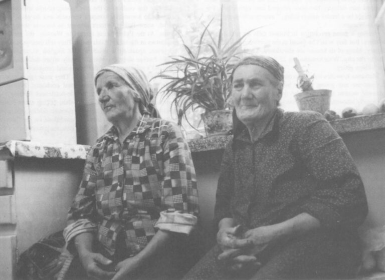 Impoverished farmer Marianna Kowalewicz (right) and her neighbor.