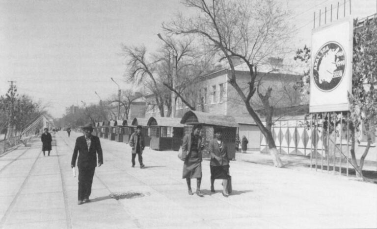 Karakalpak women in Nukus cross an irrigation ditch on the bank of Canal Number One.