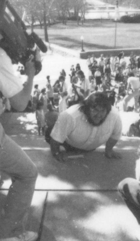 Michael Winter, director of the Center for Independent Living in Berkeley, California, crawls up the Capitol steps in protest of inaccessible buildings and transport.