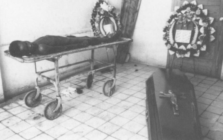 A young protestor’s body lies in the morgue of Port-au-Prince’s general hospital. He was shot by soldiers during an anti-government demonstration in July, 1987.