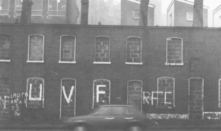 The "peace line" on Cupar Street in Belfast separates Catholic and Protestant territory.