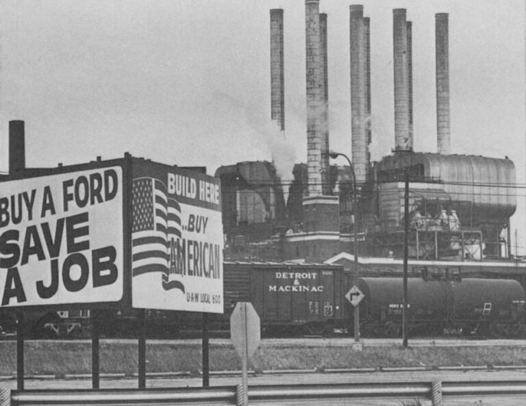 Sign in front of plant - Buy a Ford save a job