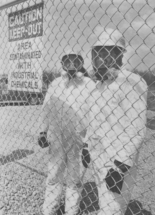 Those people whose homes were not evacuated were startled by the sight of workers wearing respirators and special protective clothing (see Johnston18.jpg). The workers looked more like moon walkers than a cleanup crew.