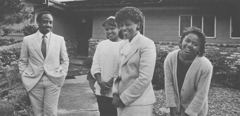 Nanine Watson with husband Carl and daughters Camille (left) and Remi (right).