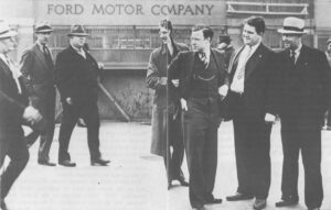 "Battle of the Overpass"–UAW organizers, including Walter Reuther (third from right) on an overpass near Ford Rouge factory just before they were attacked by members of the Ford Service Department on May 26, 1937. THE ARCHIVES OF LABOR AND URBAN AFFAIRS, WAYNE STATE UNIVERSITY