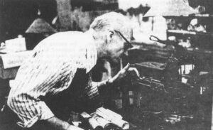 Don Winter tending to the mysteries of a Monotype caster.