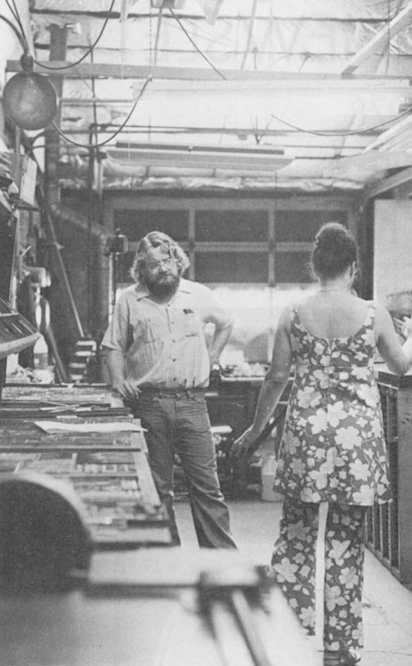 Don Wallis (left) and Dot Thomas in the back shop.