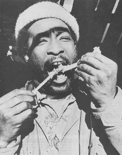 This longshoreman's name was George. He was just finishing up lunch before returning to the hold of the Manila Bataan. "We gotta get this ship loaded and get these people headed west," he said. "But a man's gotta eat, too."
