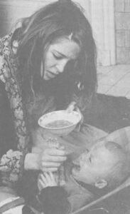 mother feeding infant