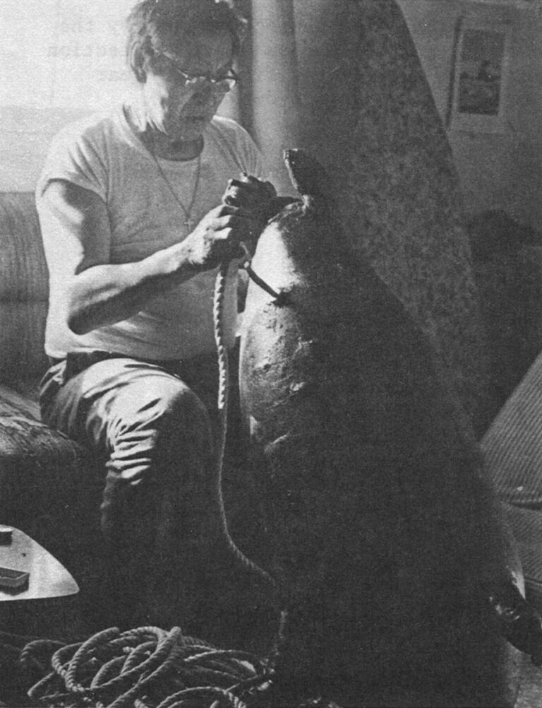The Seal Poke Float – introduced by Siberians almost 1,000 years ago, remains in use today to keep harpooned whales from sinking. Here Laurie Kingik, a famous Point Hope hunter, readies whaling gear.