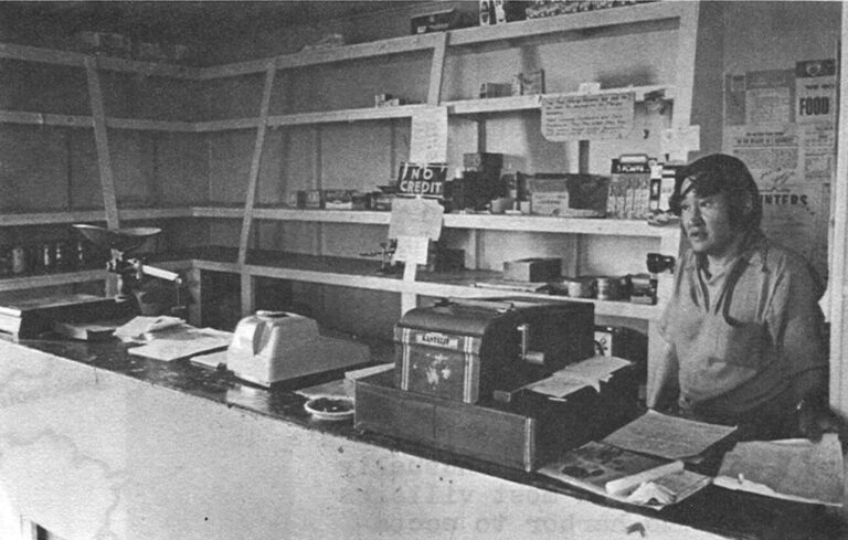 Empty Shelves – await the "North Star" at Koyuk. Store manager Fred Dewey prepares to check in a year's supply of groceries.