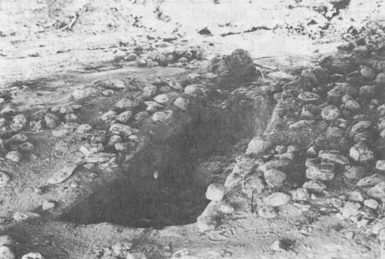 A trench through one living floor reveals that it rests upon two feet of sediments burying an earlier campsite.